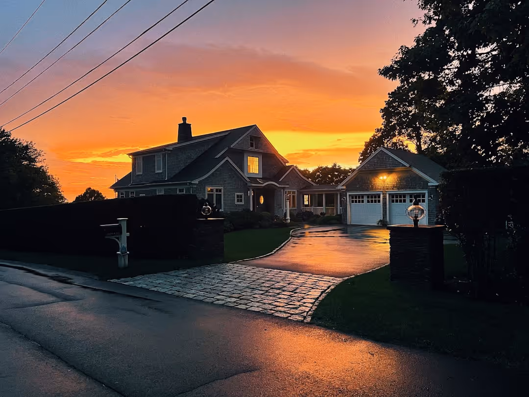 sunset over Kennebunkport homes with insurance protection overlay - Home insurance for senior citizens sunset over Kennebunkport homes with insurance protection overlay - Home insurance for senior citizens
