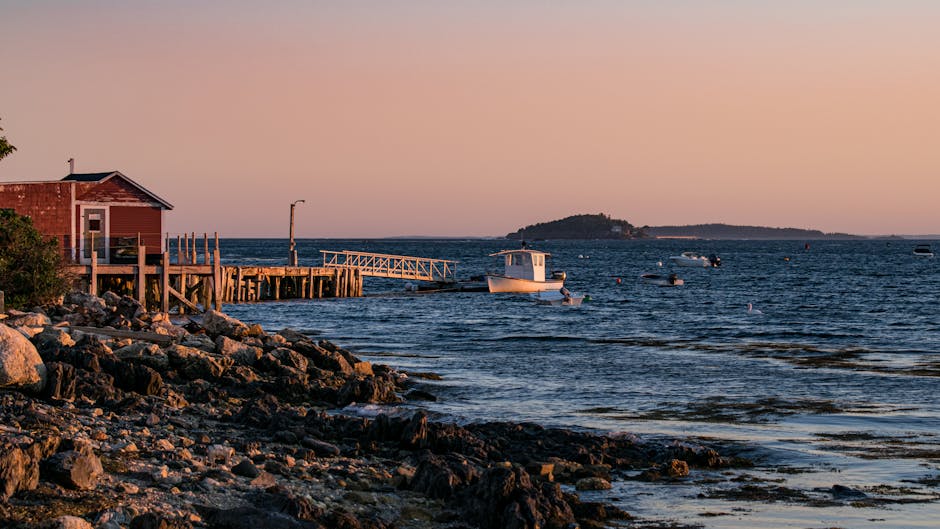 maine coastline and dock with marine boat - Boat insurance Maine concept