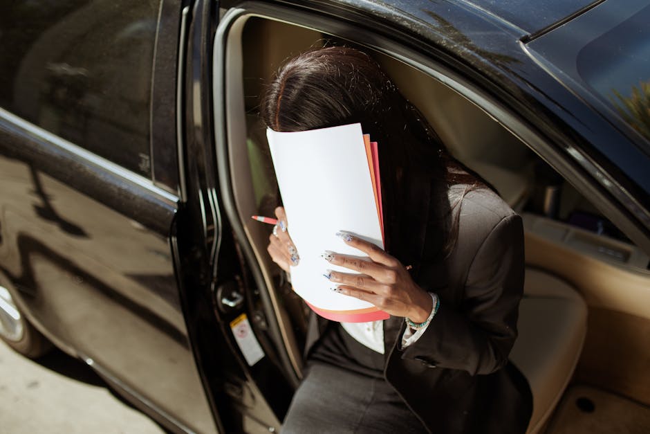 person reviewing car loan documents - Is gap insurance worth it