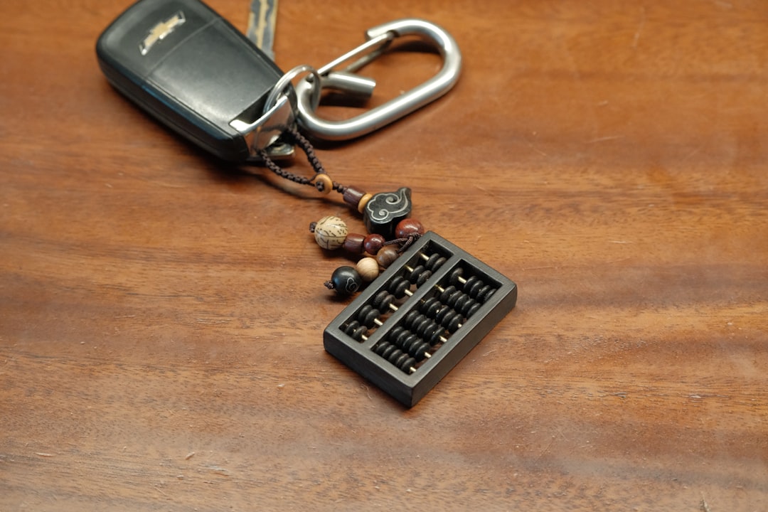 Calculator and car keys - Gap Insurance Maine