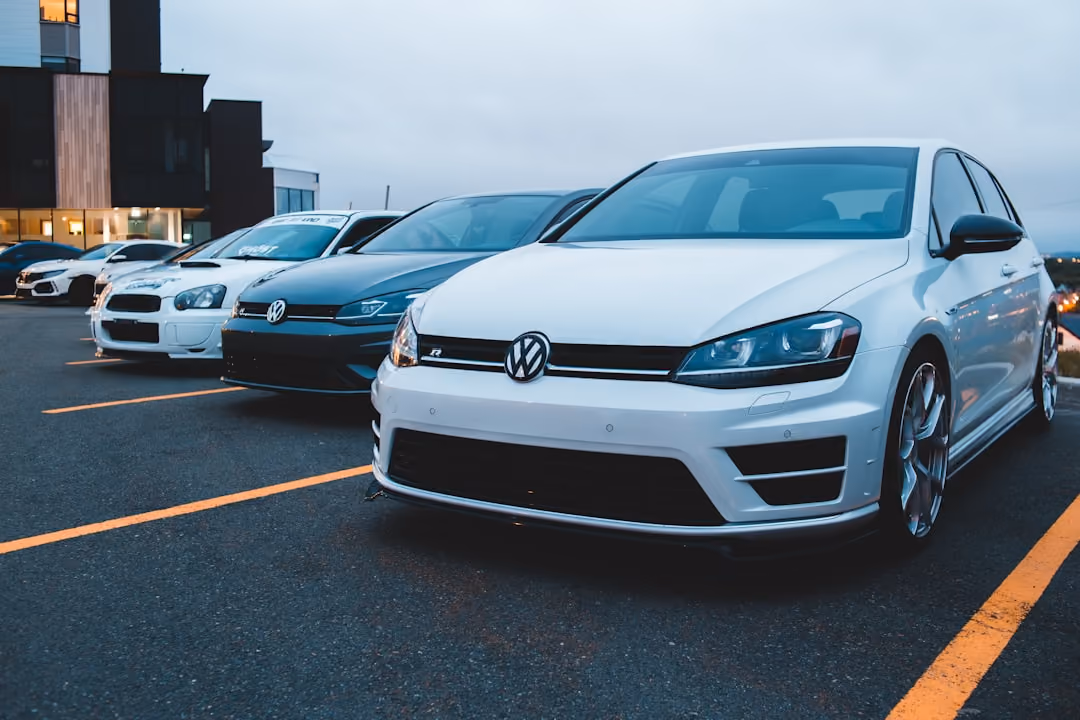 cars in parking lot - best and cheapest car insurance for young drivers