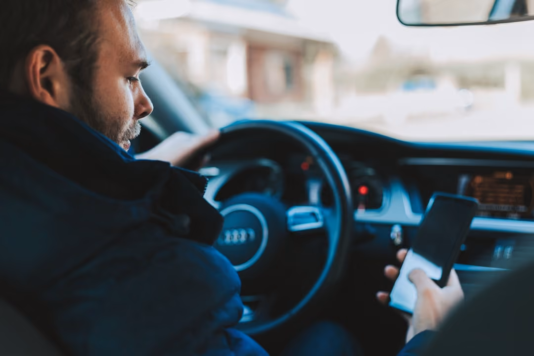 Mobile telematics app showing safe driving score and discount progress Mobile telematics app showing safe driving score and discount progress