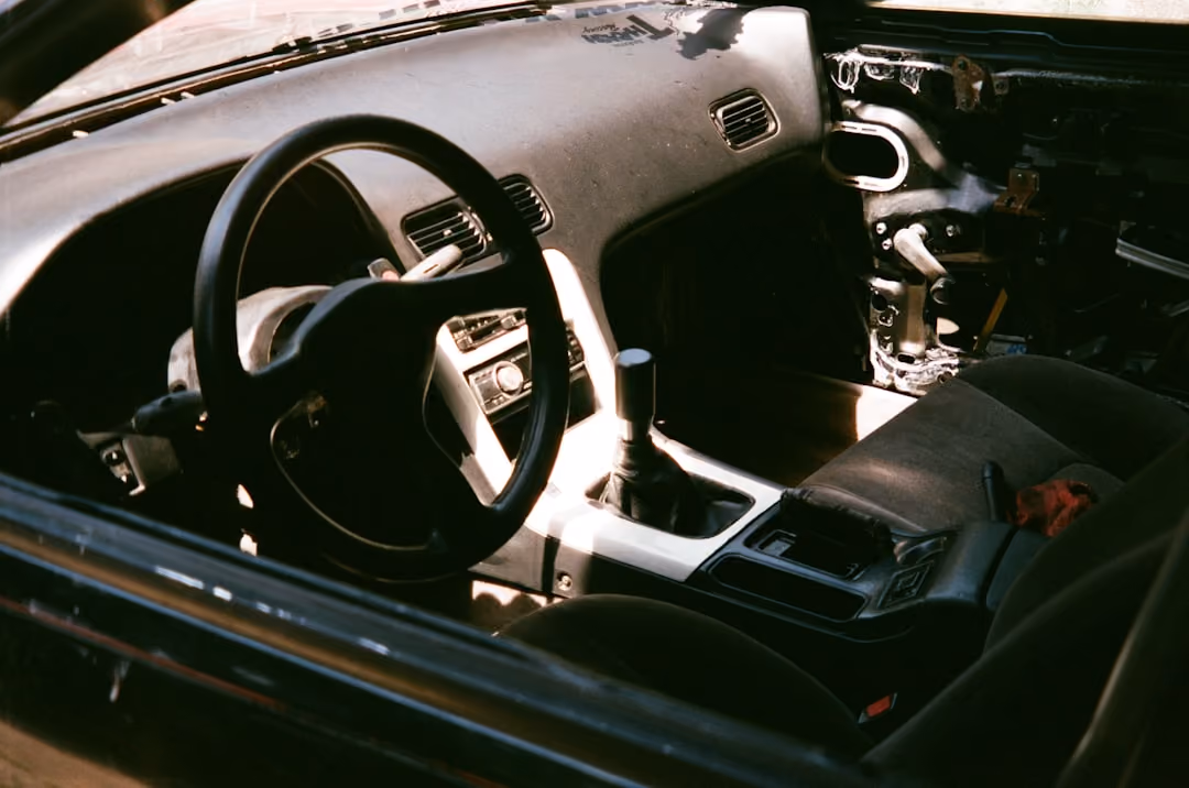 Dashboard of a modern car showing safety features and high-tech displays - Senior driver insurance Dashboard of a modern car showing safety features and high-tech displays - Senior driver insurance