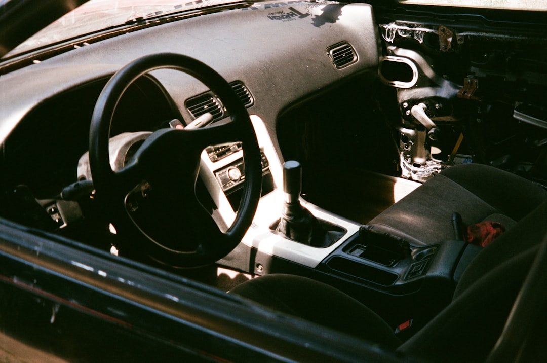 Dashboard of a modern car showing safety features and high-tech displays - Senior driver insurance Dashboard of a modern car showing safety features and high-tech displays - Senior driver insurance