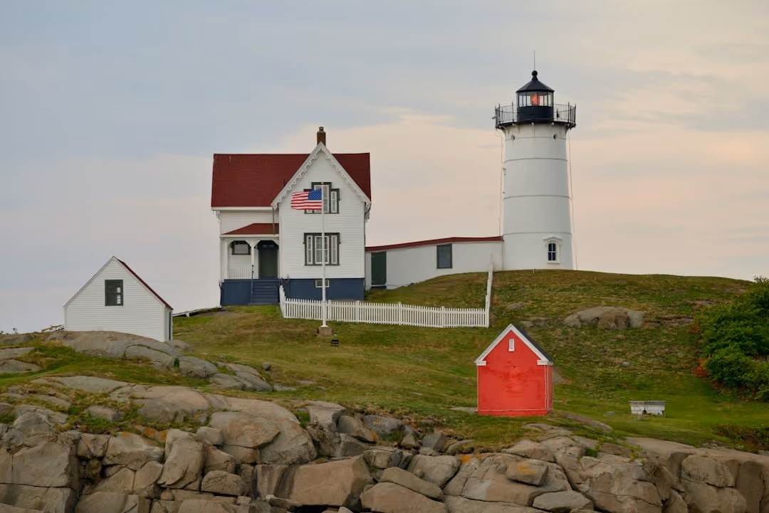 home with lighthouse on coast - comprehensive home coverage coastal Maine concept