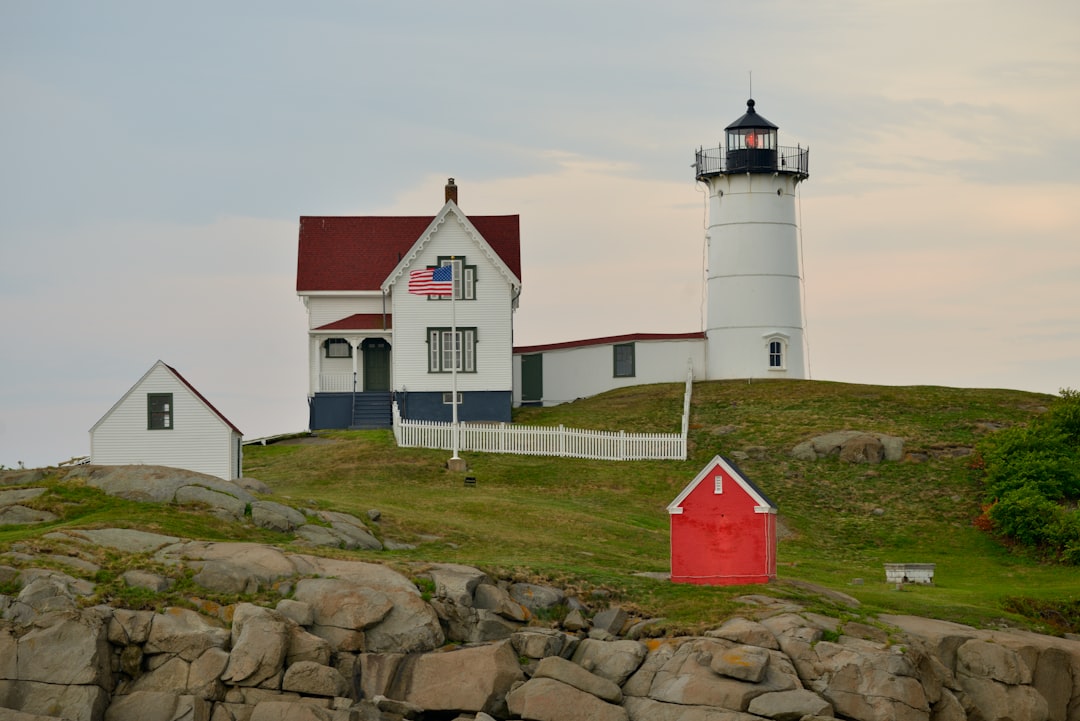 home with lighthouse on coast - comprehensive home coverage coastal Maine concept