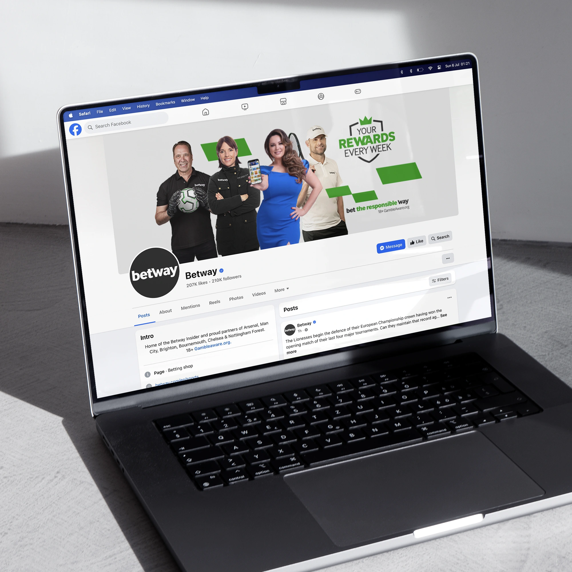 A laptop showing Betway's Facebook page, complete with a Your Rewards Every Week branded cover image.