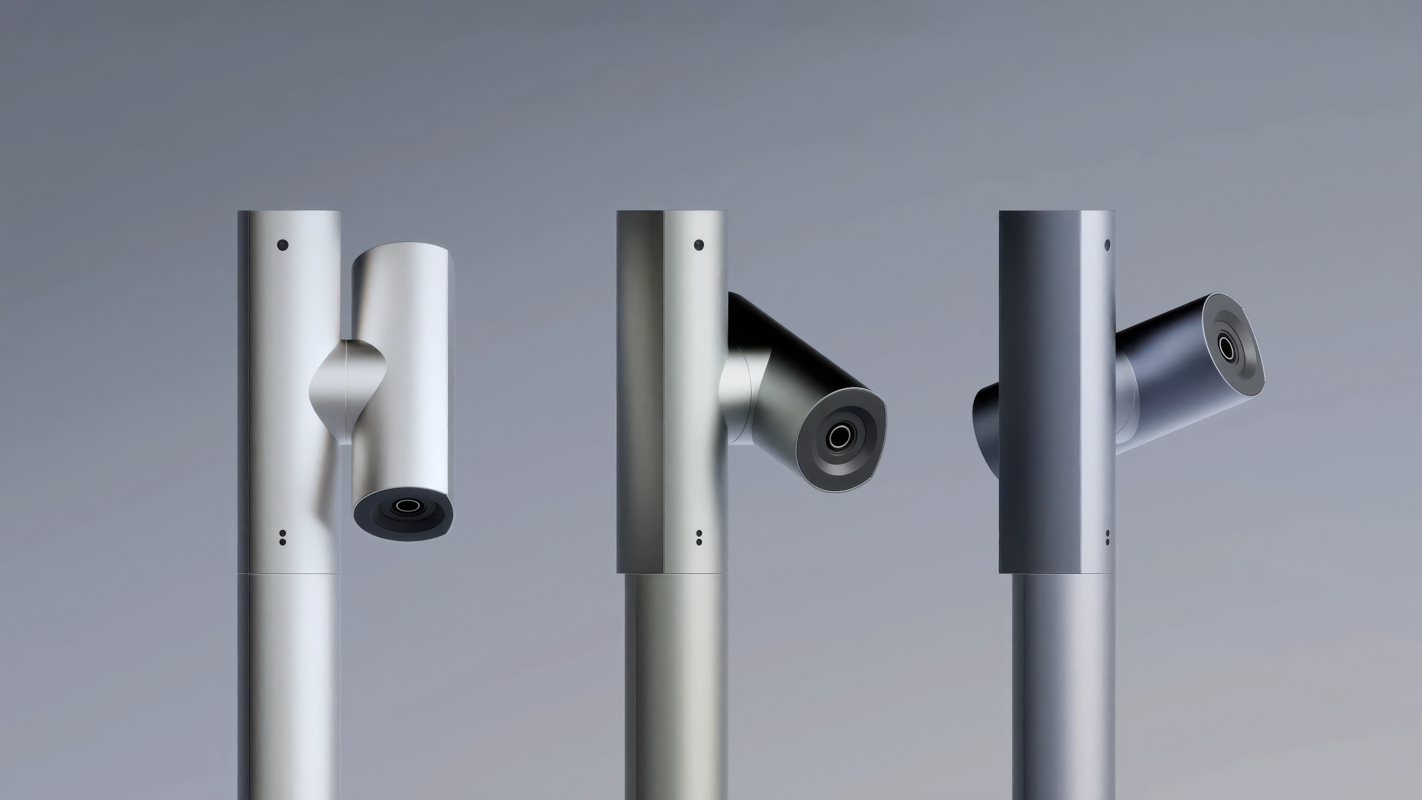 Three Avert Sentry's with different metallic finishes against a grey background.