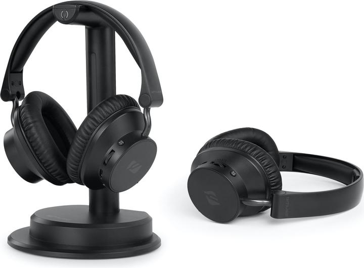 Casque audio sur son support à côté d'un casque Bluetooth