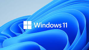 Logo Windows 11 sur fond d'écran bleu