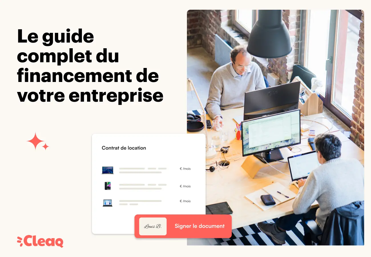 Équipe travaillant sur des ordinateurs dans un bureau aux murs de briques