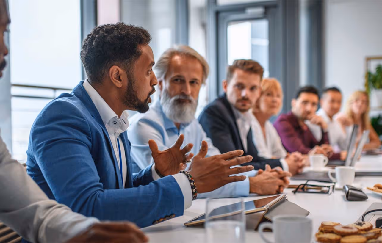 corporate business meeting with male person speaking