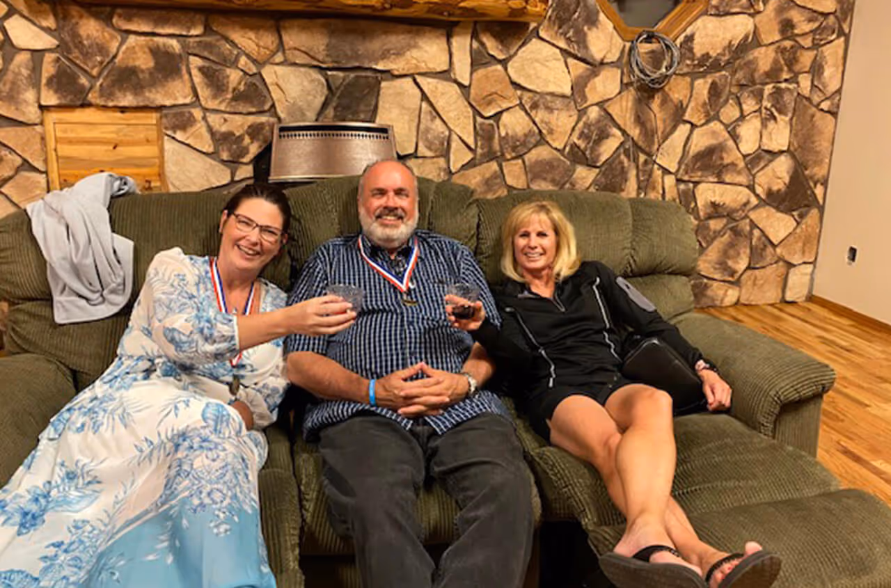 caption first team outing - sitting on couch