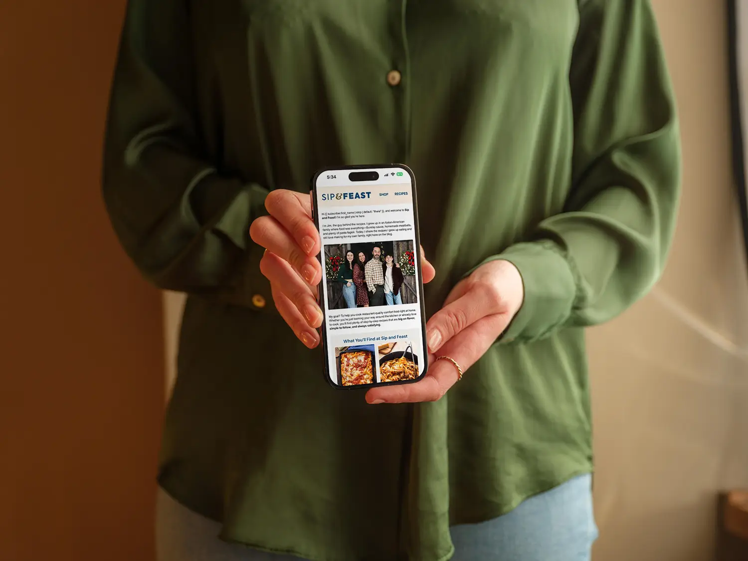 Female holding an iPhone