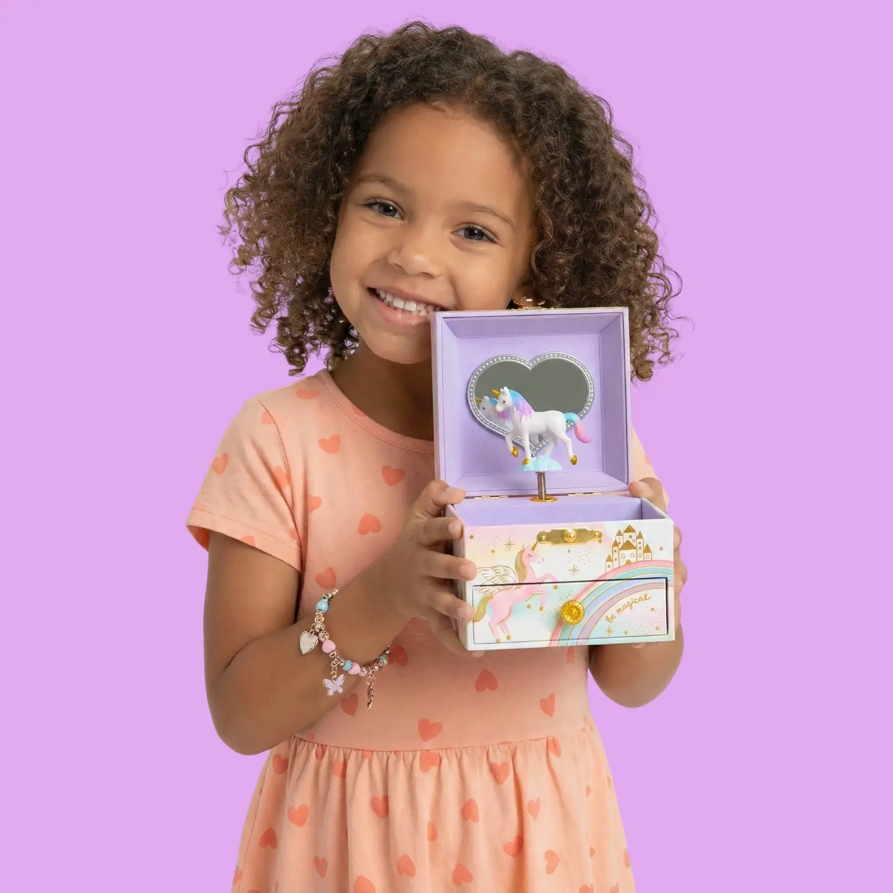 Little girl with jewelry box