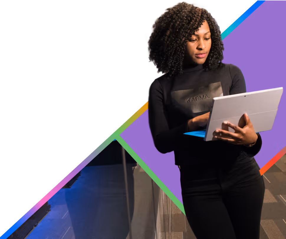 Woman standing with a laptop - First Technology Datacentre & Cloud Header Image