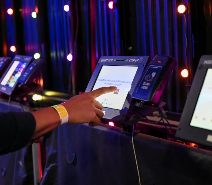Events and Festivals: Multiple Billfold POS terminals set up at an event, demonstrating on-site support and RFID wristband activation for seamless operations