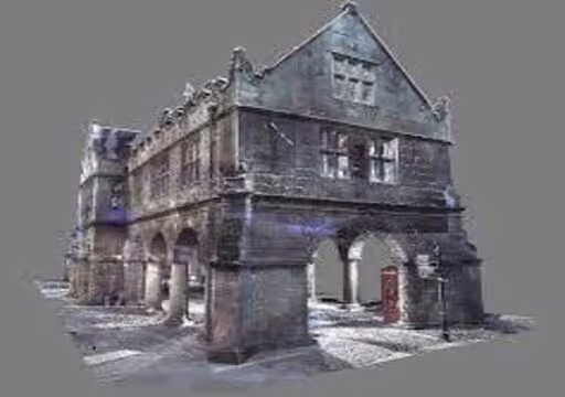 Old stone building with arches on ground floor and a gabled roof against gray background.