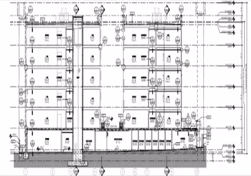 Architectural blueprint of a multi-story building with rooms, walls, and structural details.