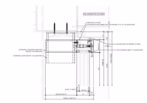 Technical drawing of a curtain wall section with detailed labels for insulation, gaskets, glass, and construction elements.