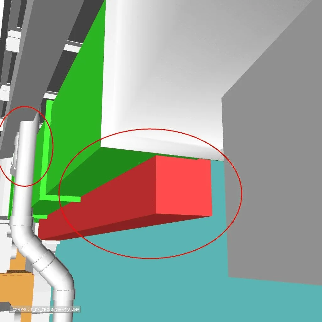 3D architectural model showing colored blocks and pipes with two red circles marking areas.