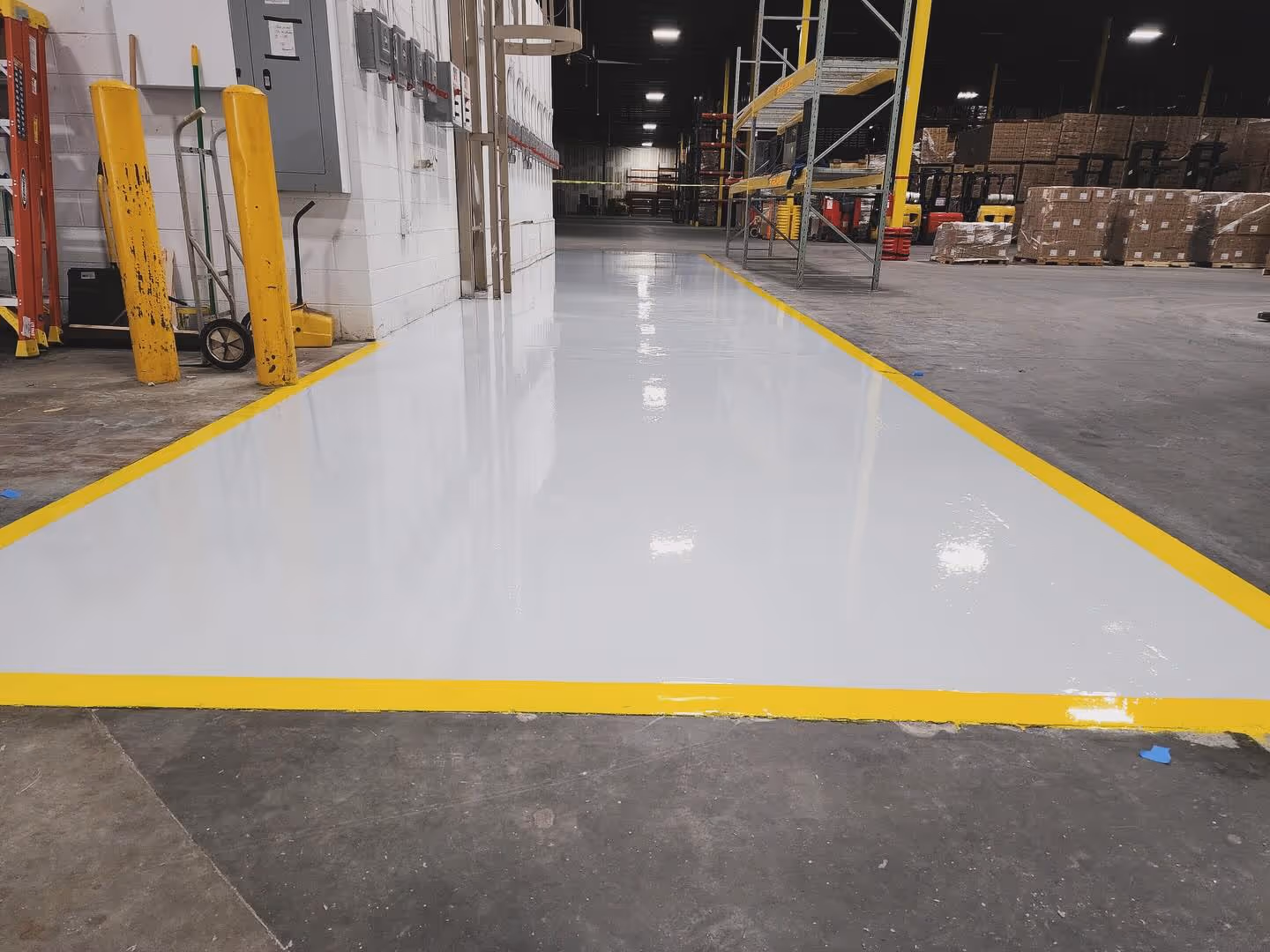 High build epoxy hangar deck with layout striping installed by ACC Facility Services in Marietta, GA