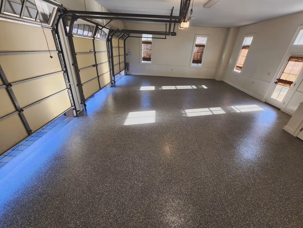 Epoxy flake garage floor coating in a Suwanee, GA family garage