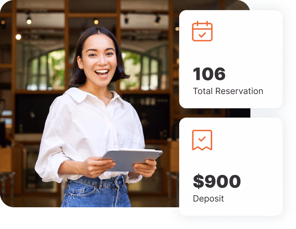 Restaurant staff member reviewing transparent pricing and reservation analytics on a digital device.