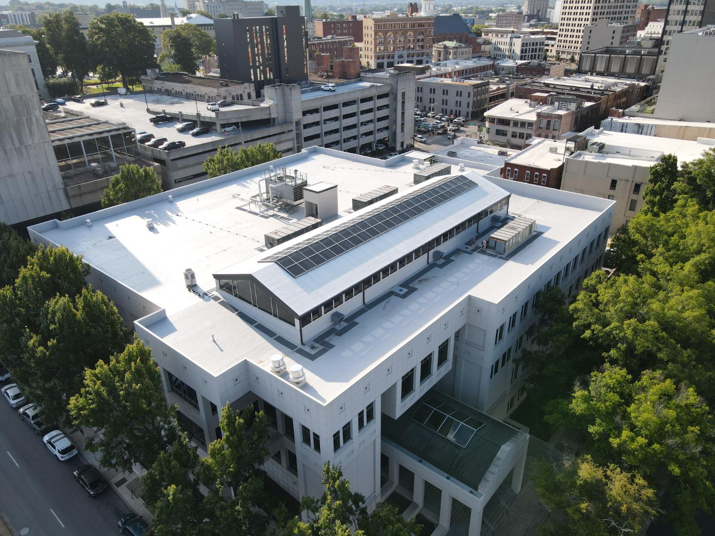 Drone photo of new white roof installation at Hamilton County Courthouse in Tennessee