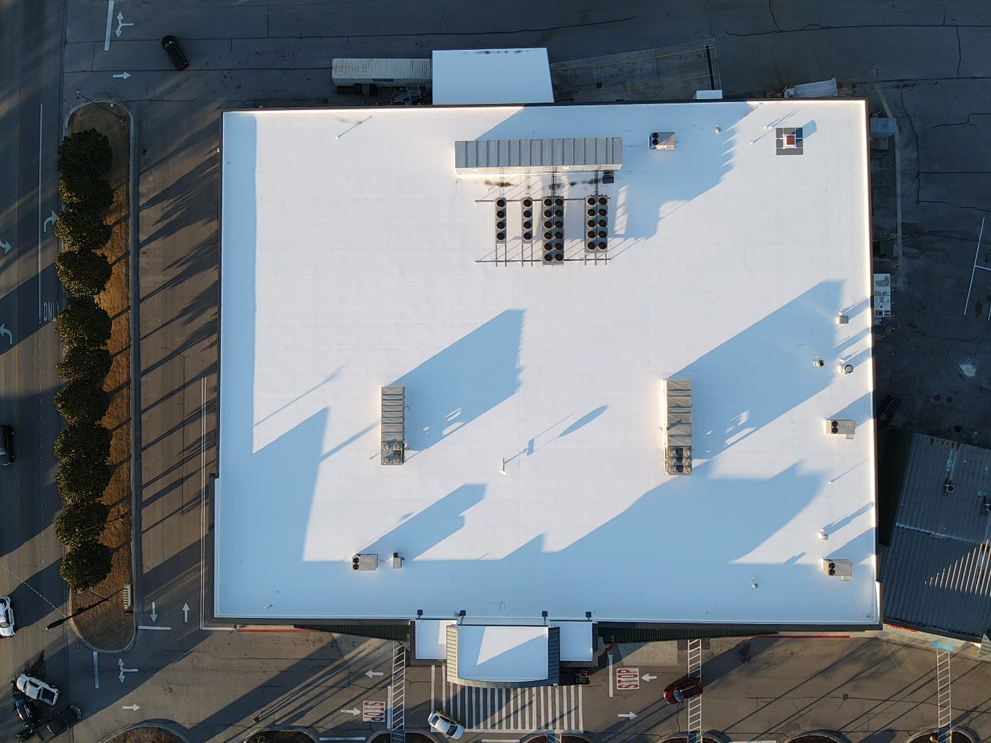 Top-down aerial image of Johns Manville 60 mil TPO roof installation at Eastside Junction