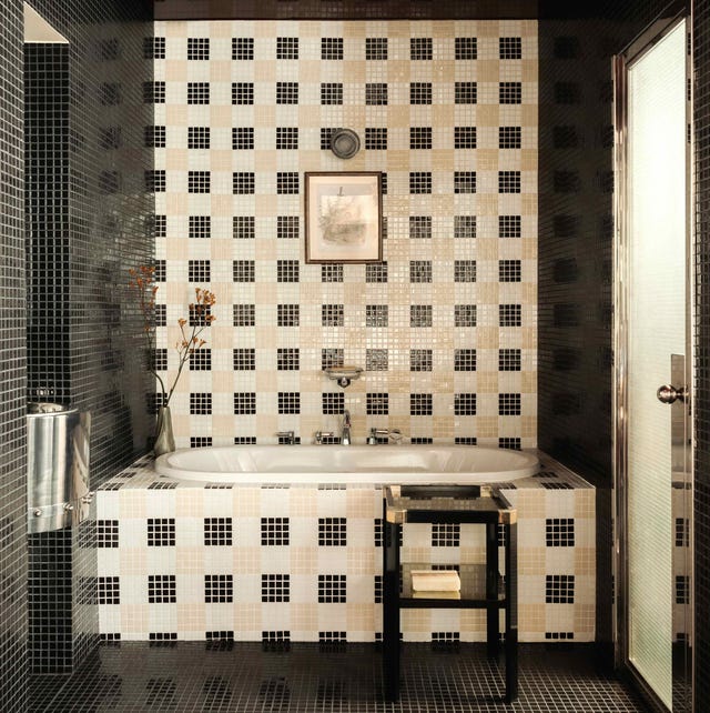 black beige and white mosiac tiles builtin bath