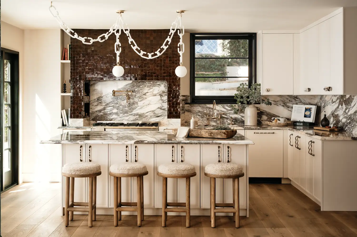 cream kitchen with brown tiles