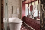Photographed by Anson Smart, interior design by Greg Natale, styled by Joseph Gardner. From a bold, colourful and masterfully Italianate revival of an Upper North Shore Sydney home It may generally be one of the smaller rooms within a home, but there’s no reason why a bathroom can’t still pack a punch. More often than you may expect, a bathroom is an outlet for the more outlandish stylistic choices—an opportunity for the owner or designer to experiment with tilework or wallpaper that may feel too bold in the houses' more public spaces. There need not even be cohesion across the bathroom and the rest of the home; these are rare rooms that can exist entirely independently of the rest of the design brief. A sanctuary of self-care, the place where you can start the day strong or unwind after chaos, a bathroom serves multiple, vital purposes. Sleek and minimal, colour-drenched or calm, these bathrooms and powder rooms prove that there are so many ways to decorate these spaces. If you’re in search of inspiration, you’ve come to the right place, as 2025 has proved particularly fruitful in this department. Beacons of expression and individuality, these are the best bathrooms we’ve featured in Vogue Living this year.
