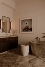 Photographed by William Jess Laird, architecture, interior design and styling by Gachot. From inside a converted West Village loft cloaked in chestnut wood and blush tones
