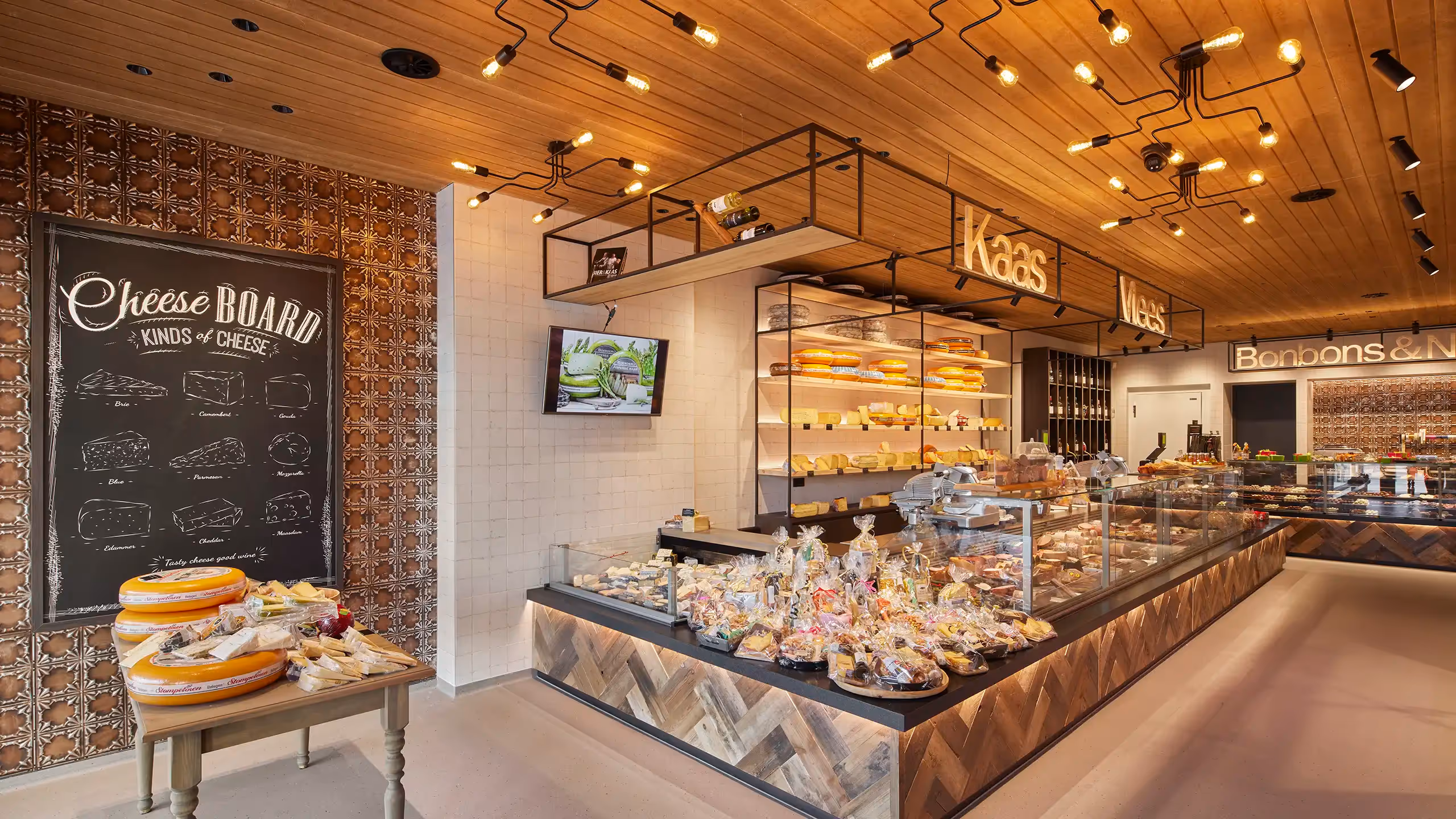 Lichtplan voor specialiteitenzaak, bestaande uit basisverlichting, richtspots en lichtlijnen.