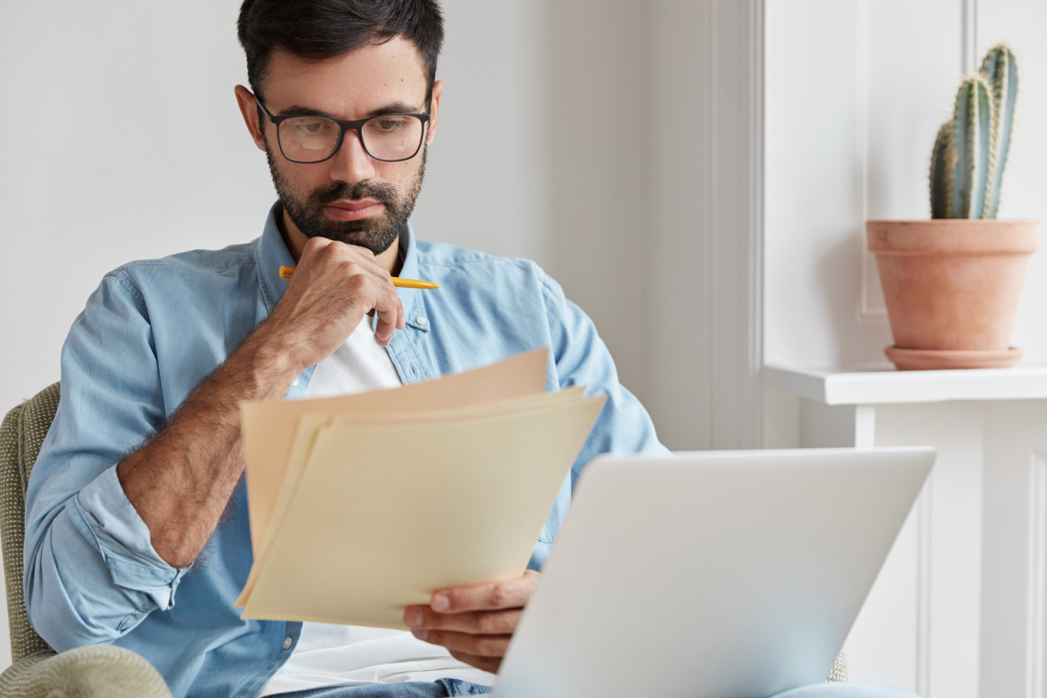 man going over documents