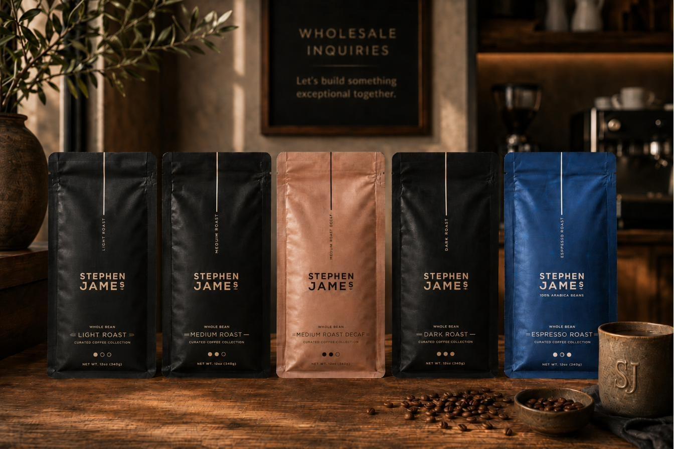 Five Stephen James Curated Coffee Collection roast bags presented together in a premium coffee setting.