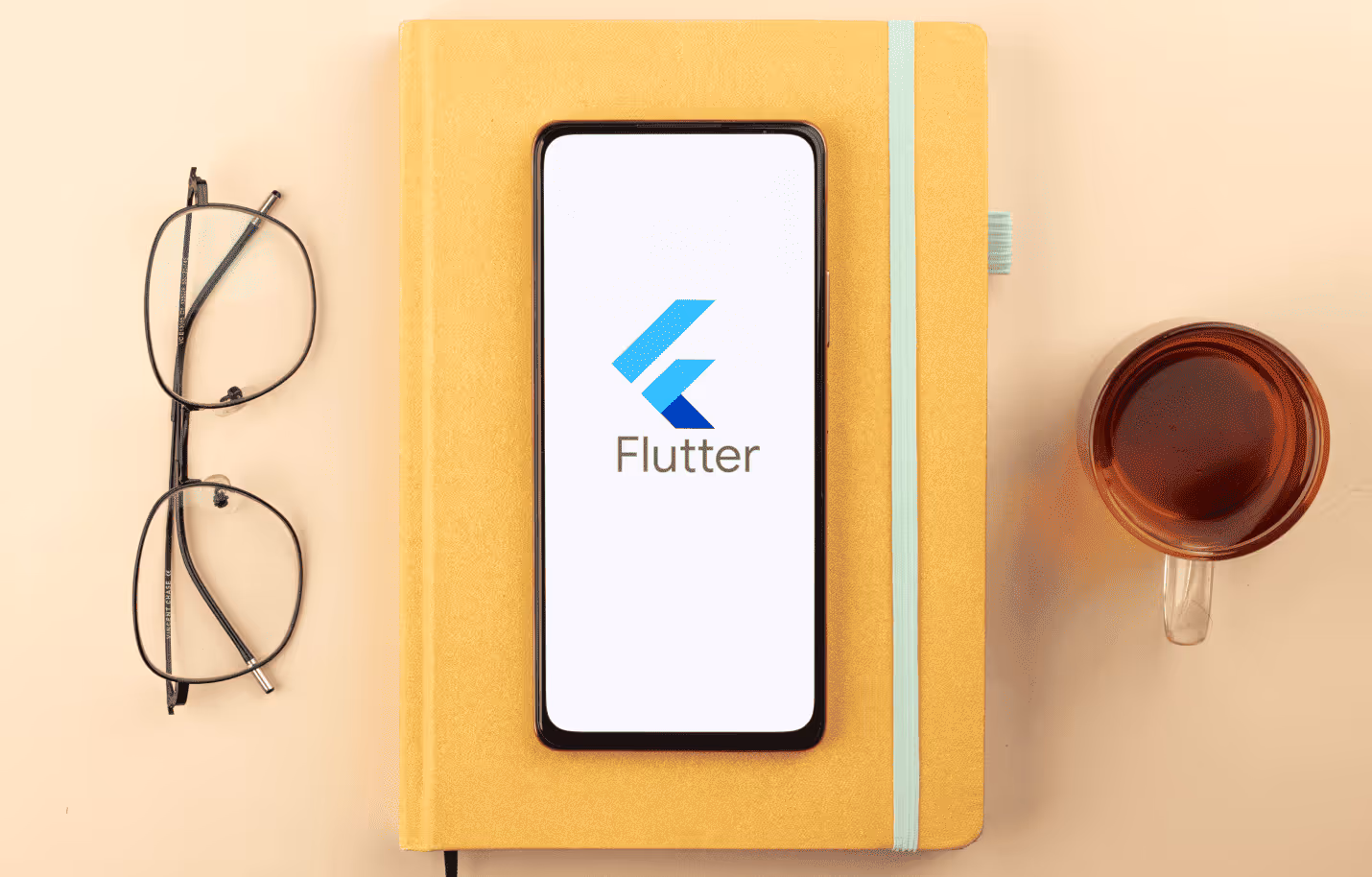 Flutter logo on mobile phone 