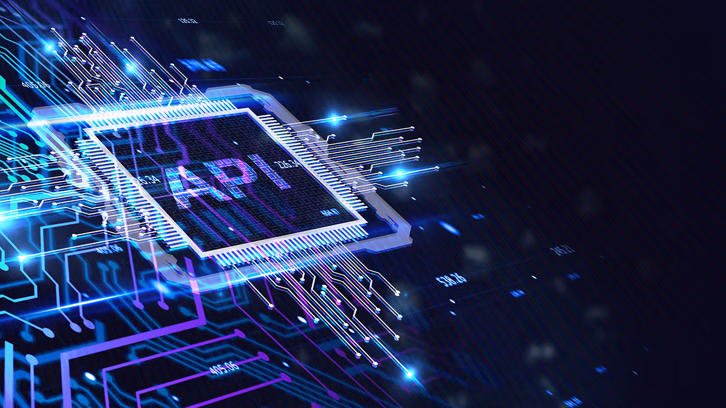 Glowing microchip with API text and digital circuit lines on a dark blue glowing background.