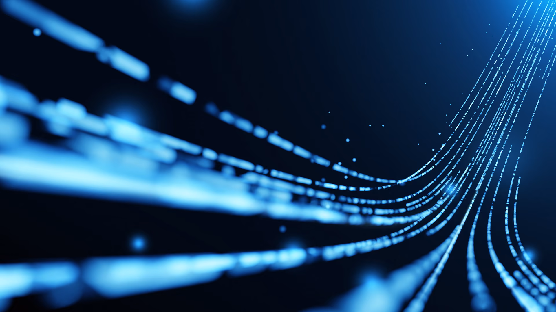 Blue glowing lines and dots flowing diagonally on a dark background, resembling data streams.