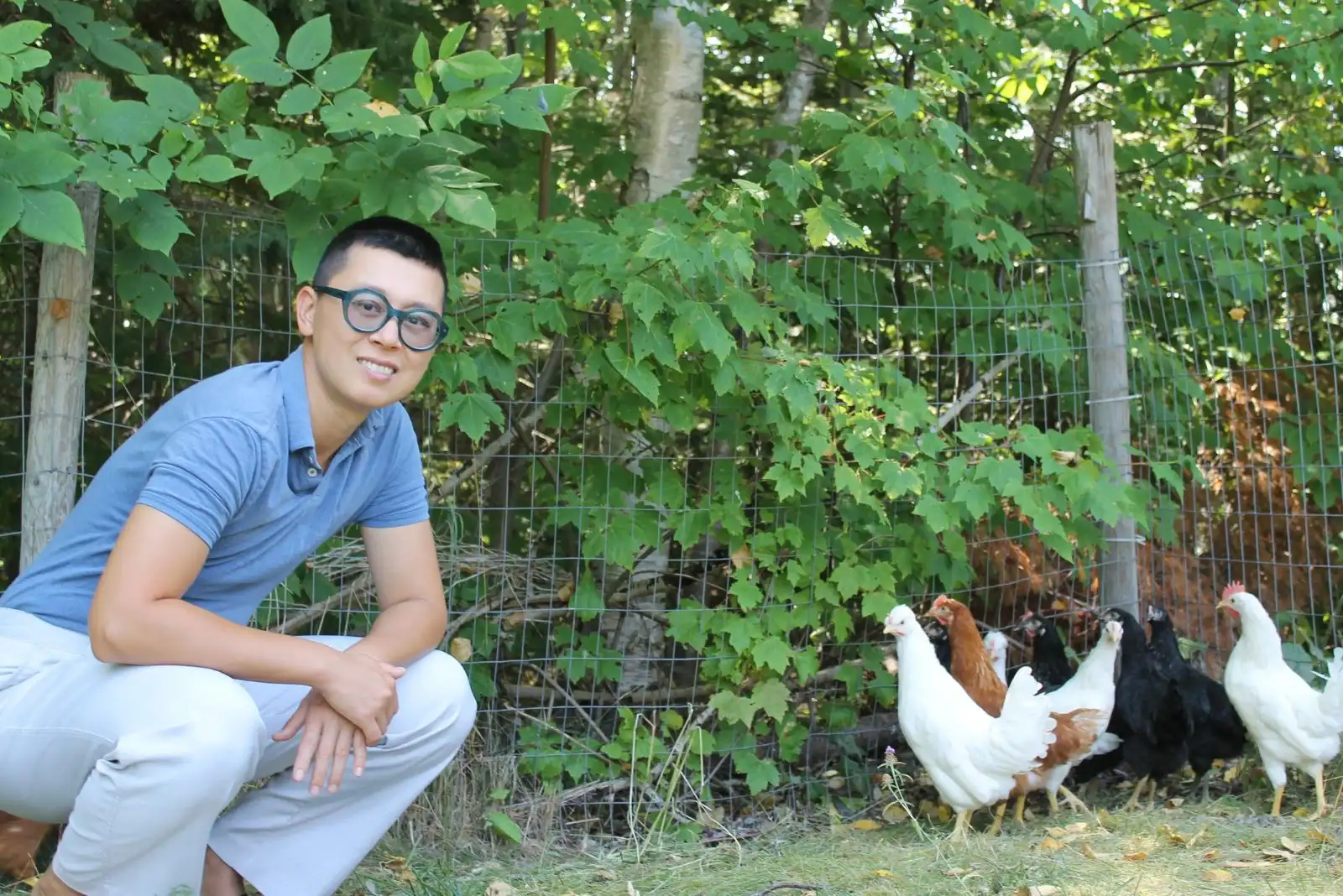 Shift Collab therapist Ming Ma smiling with animals lifestyle image.