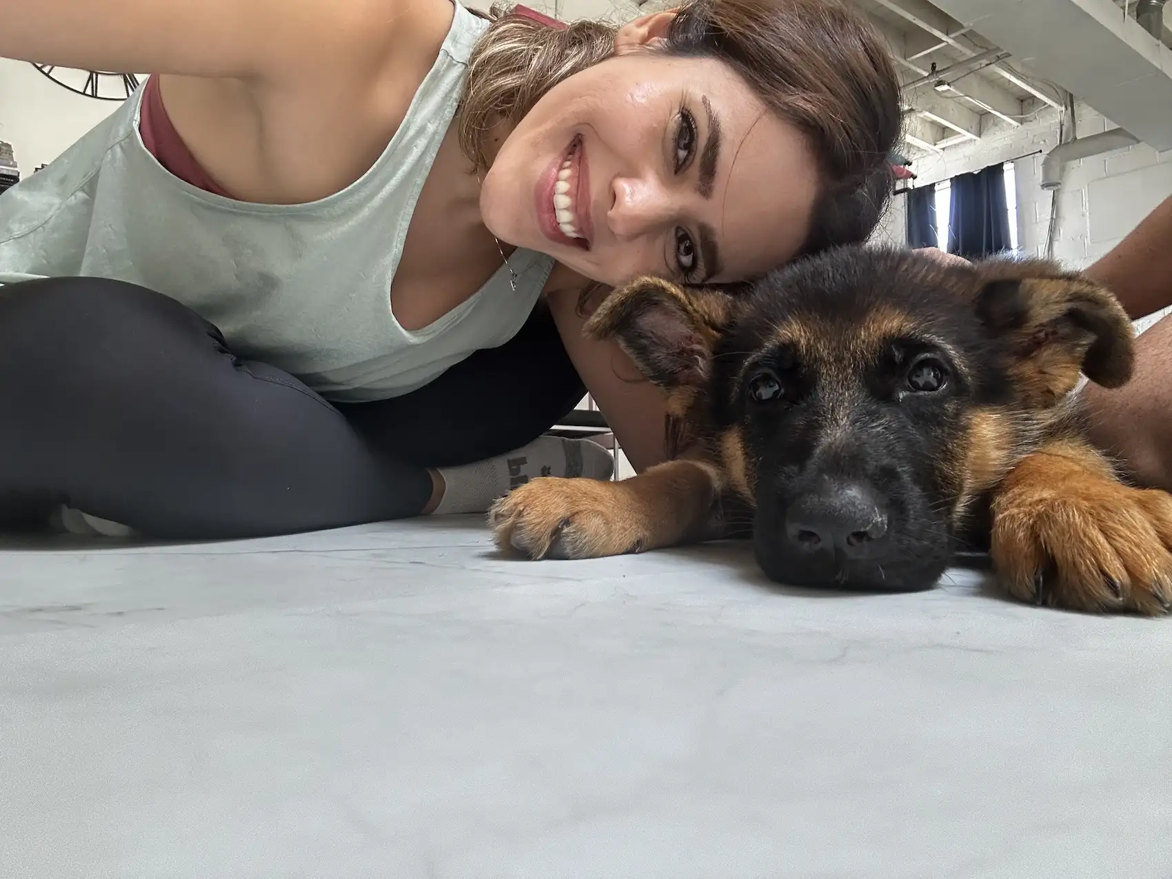 Shift Collab therapist Maryam Akhshi lifestyle image with pet dog.