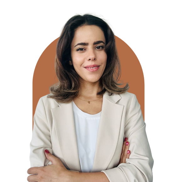Headshot of Maryam Akhshi from waist up smiling in a business casual top.