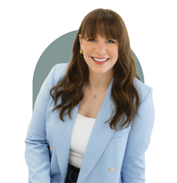 Headshot of Megan Rafuse from waist up smiling in a business casual top.