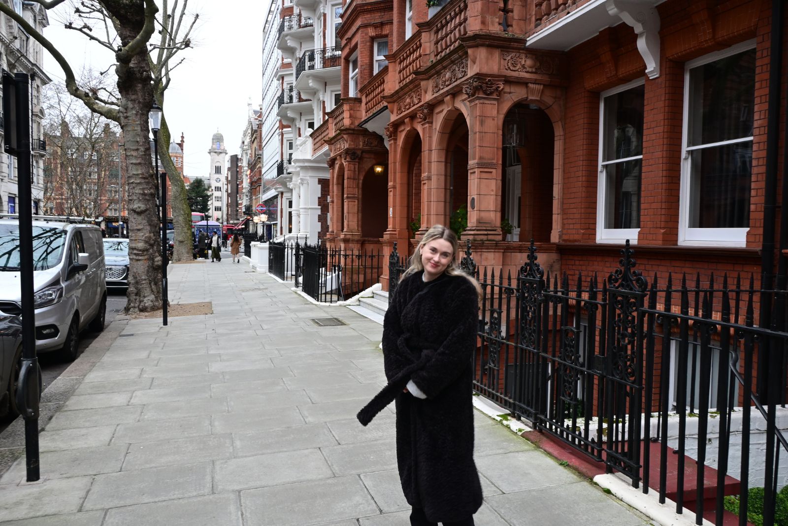 lifestyle image of Nadia McNairn smiling in the city