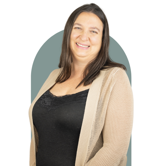 Headshot of Erica Eugenio from waist up smiling in a business casual top. 