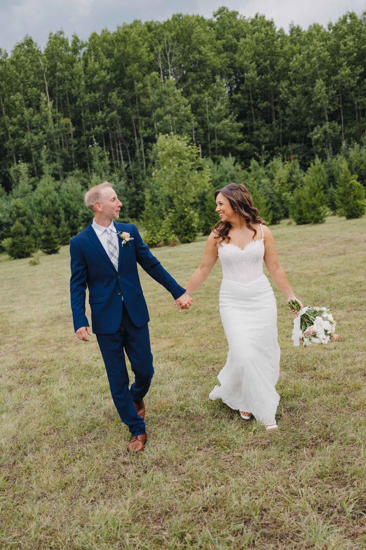 Cute couple walking together holding hands.