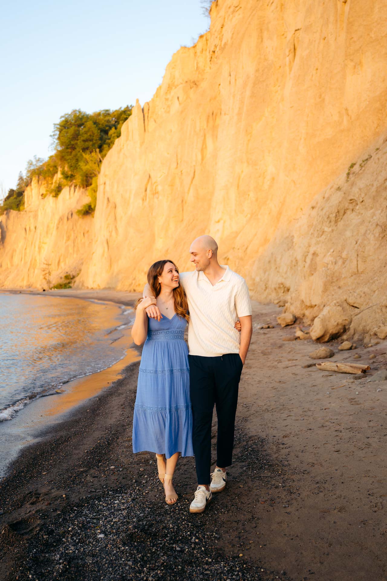 couple walking by the beach