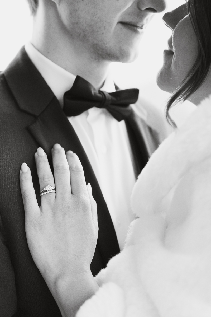 Close up of couple hugging.