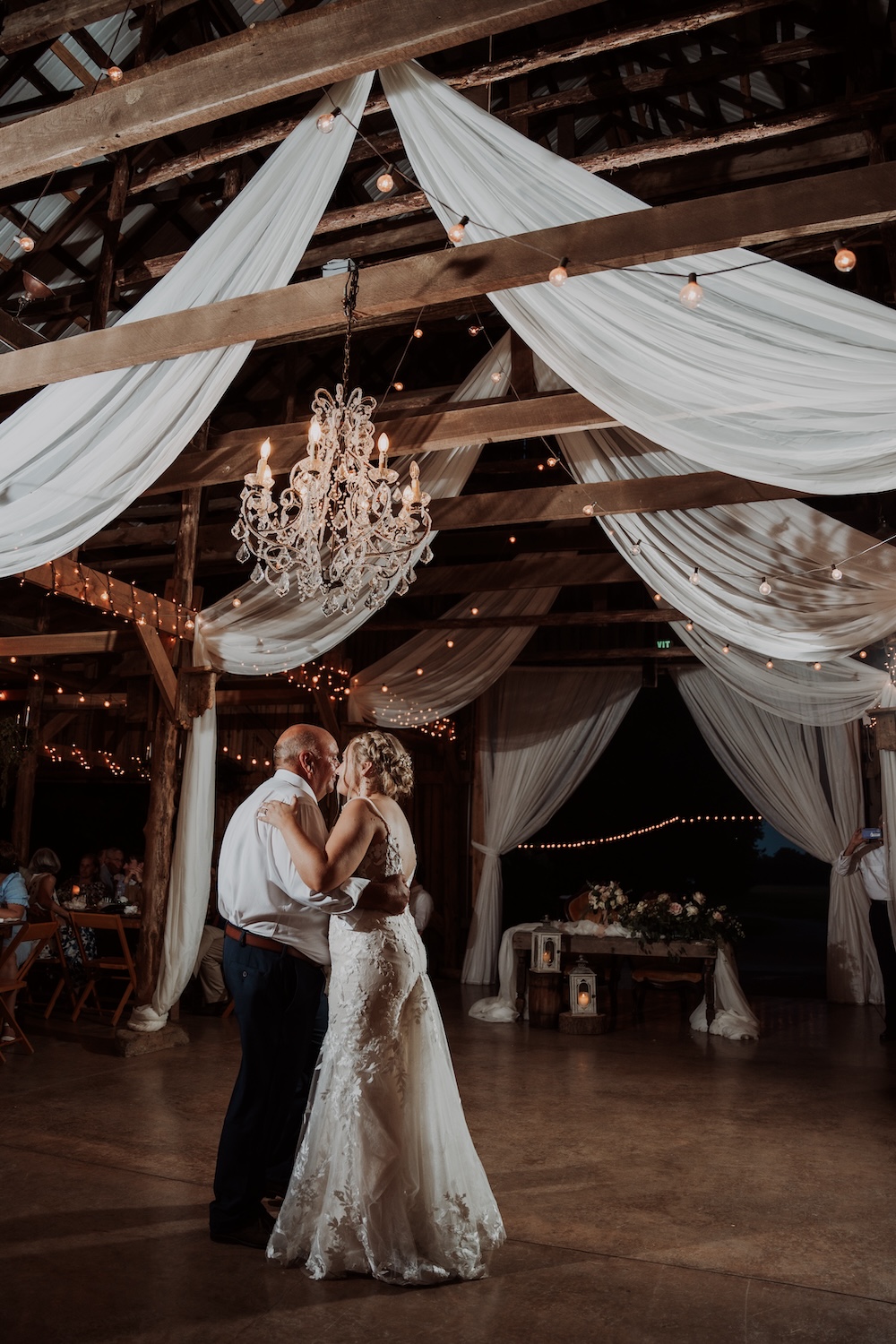 Father, daughter dance during the wedding reception at The Barn at Cedar Grove. 
